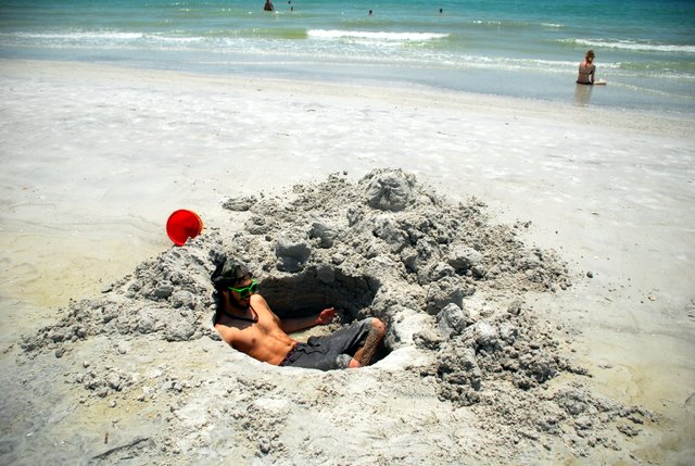 frank-sitting-in-a-sand-hole.jpg