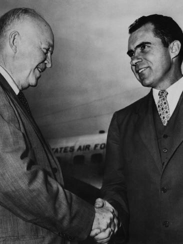 us-president-dwight-d-eisenhower-shaking-hands-with-vice-president-richard-nixon-1950s.jpg